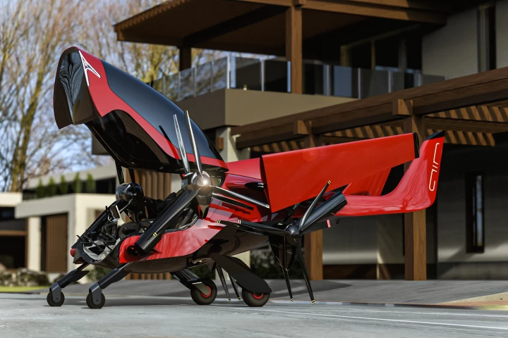 AIR One prototype with wings folded into sleeker transport and storage form, cockpit wide open