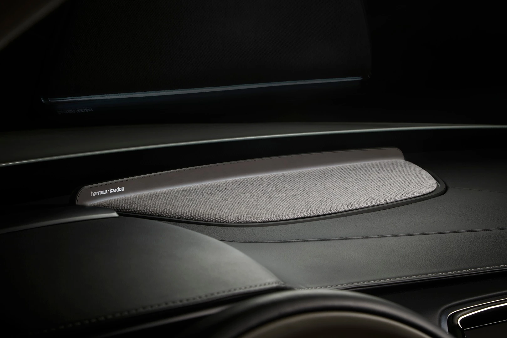 These door panel "shape-shifting" speakers are a part of Harman's new experience