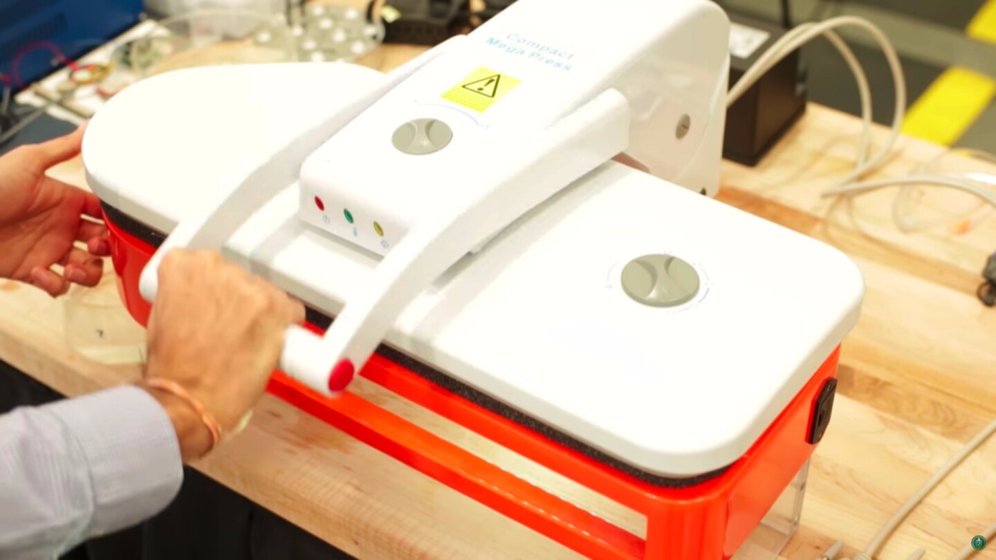 A press dryer that uses high-frequency vibrations rather than heat to dry clothing