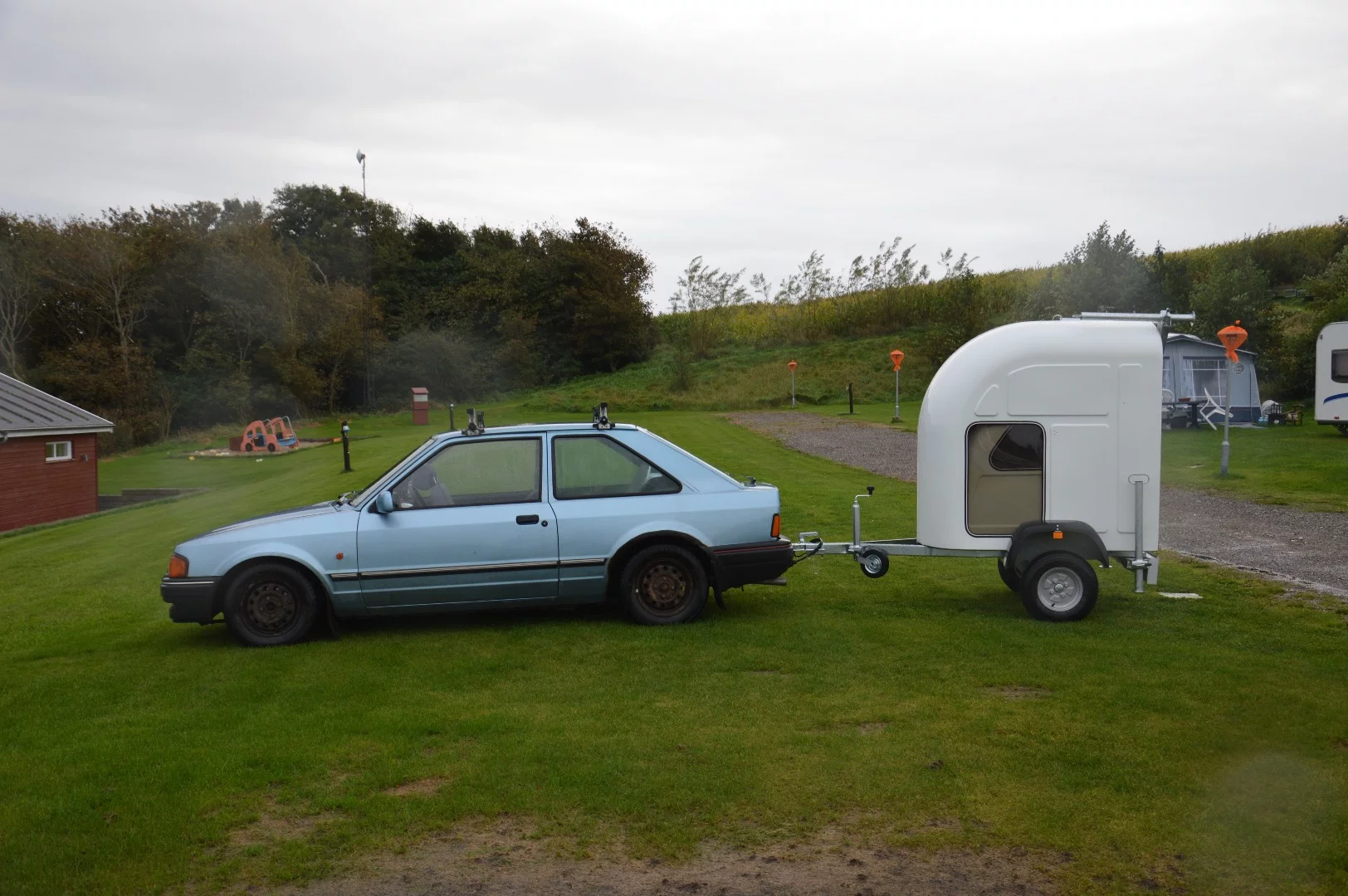 Due to the extra weight of the trailer and need for greater rigidity in the shell, total weight for the Homie comes in at 200 kg (440 lb)