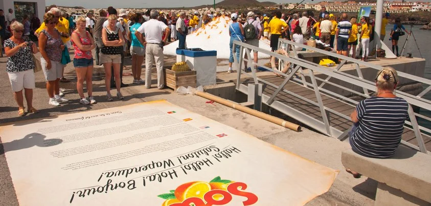 Inside the bottle is a case of Solo and a 12 square meter (129 square foot) letter in various languages