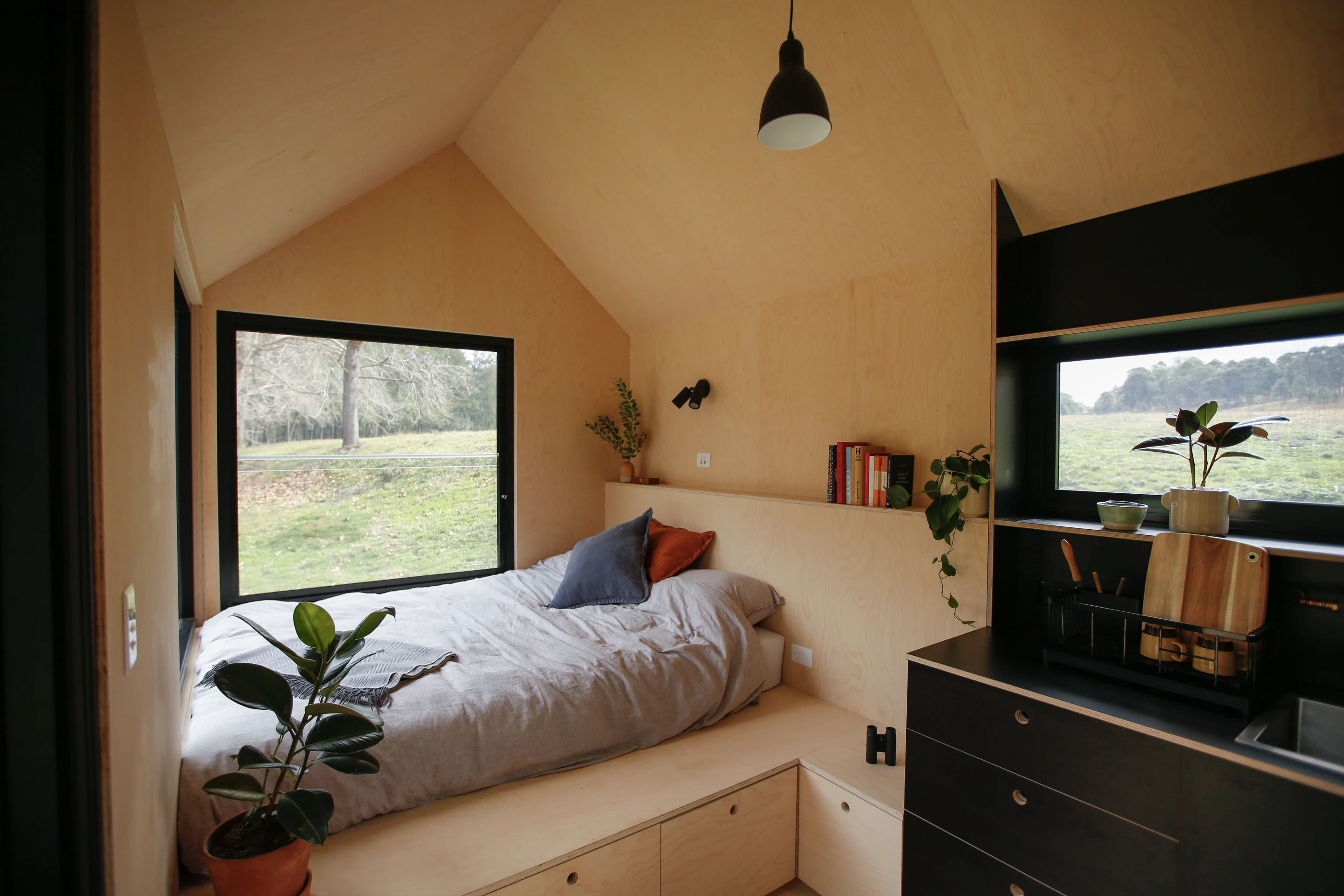 The Barrington Tops Cabin's sleeping area boasts generous glazing