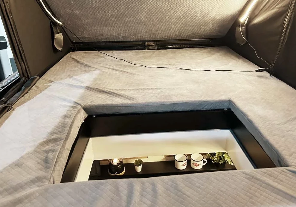 Families can more easily talk and spend time together with Sportcaravan's trailer-to-tent hatch
