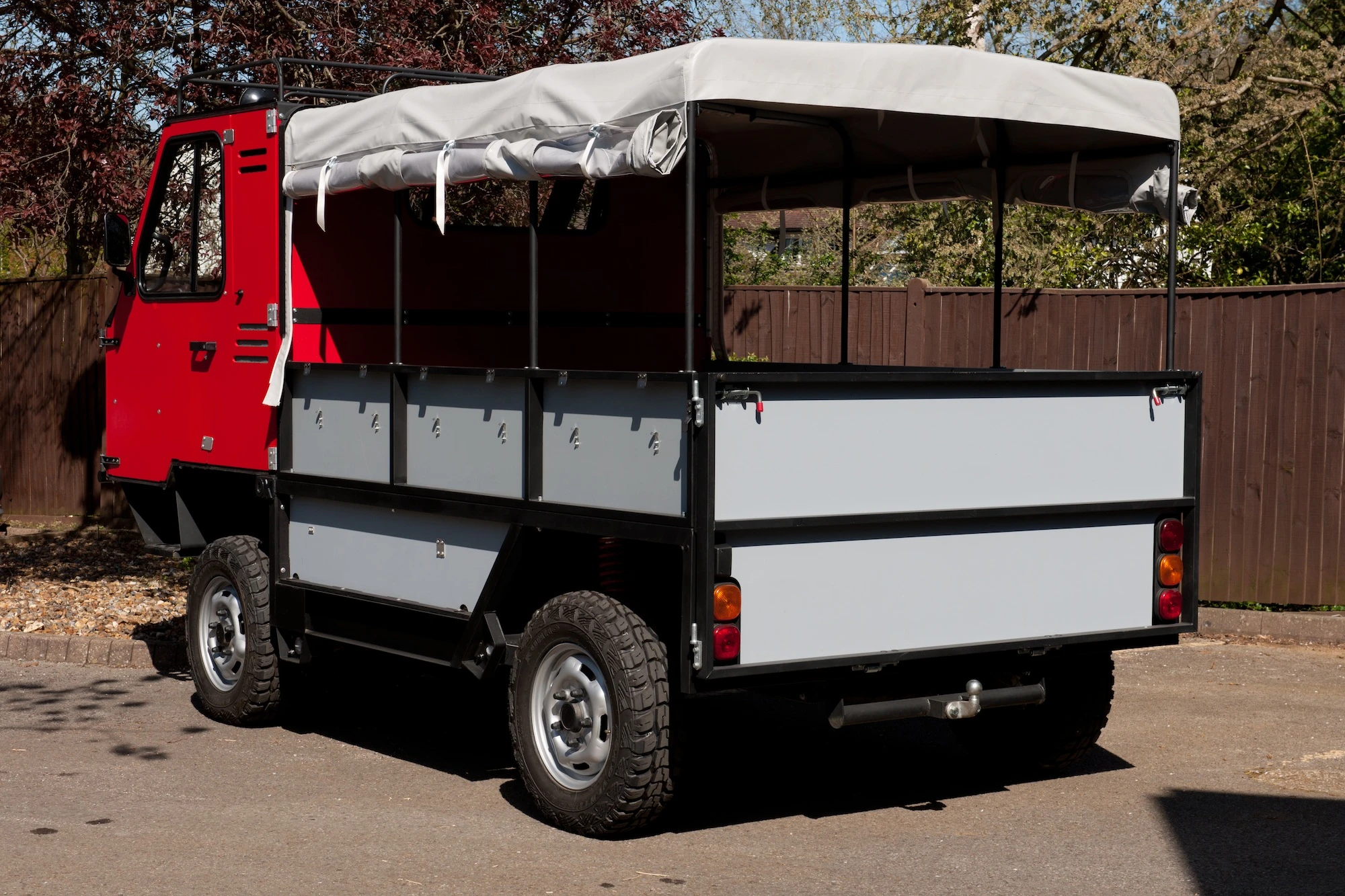 OX can transport up to 13 people, eight 44-gallon oil drums, or a total of 2,000 kilograms (2.2 US tons) in weight