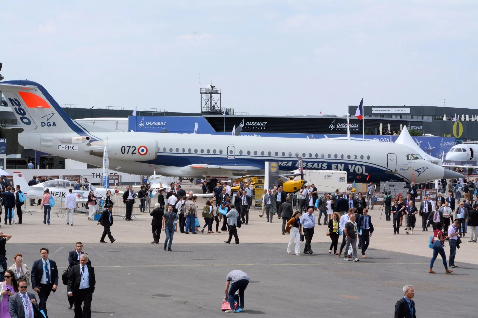 A Fokker DGA Essais en Vol modified by Sabena Technics greets crowds on their way to the Concorde Hall at Le Bourget