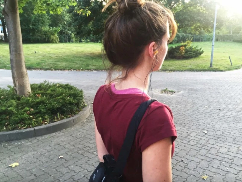 A user models the EarFS ear plug