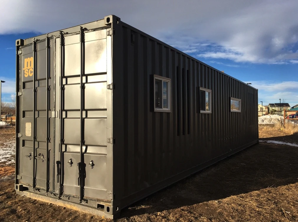 The Intellectual Tiny Home is based on a 40 ft (12 m)-long shipping container