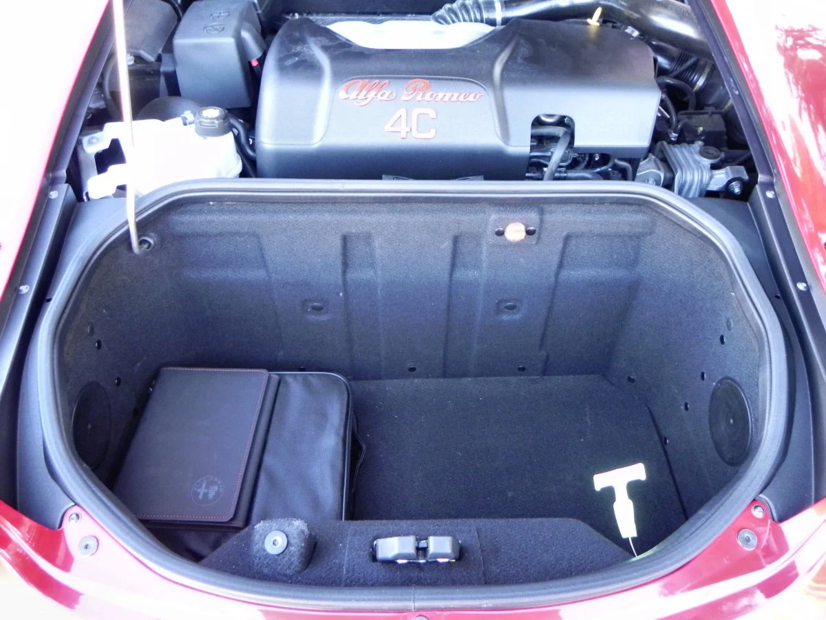 Behind the engine is a carbon fiber tub moulded into the body structure that makes the, for lack of a better description, "cargo space" in the Alfa Romeo 4C