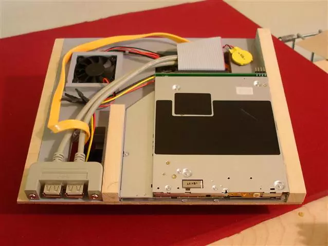 Inside the vertical panel, showing the optical drive and USB ports