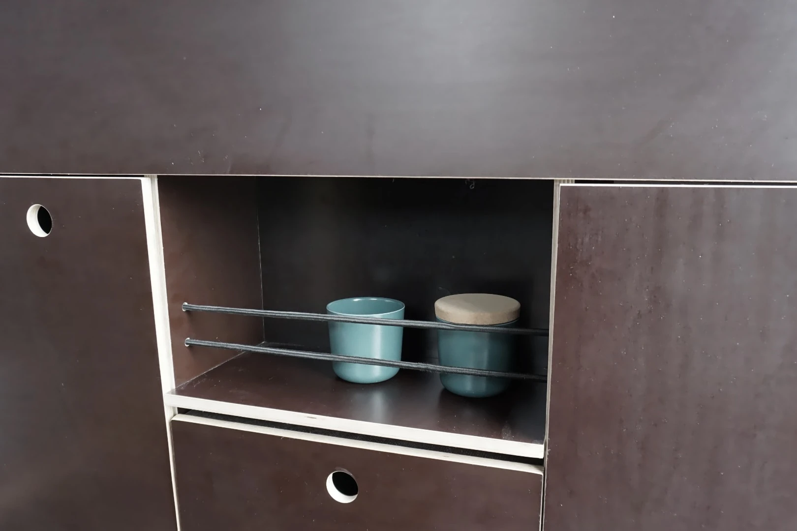 The interior carpentry is made using European birch plywood and features loads of storage compartments