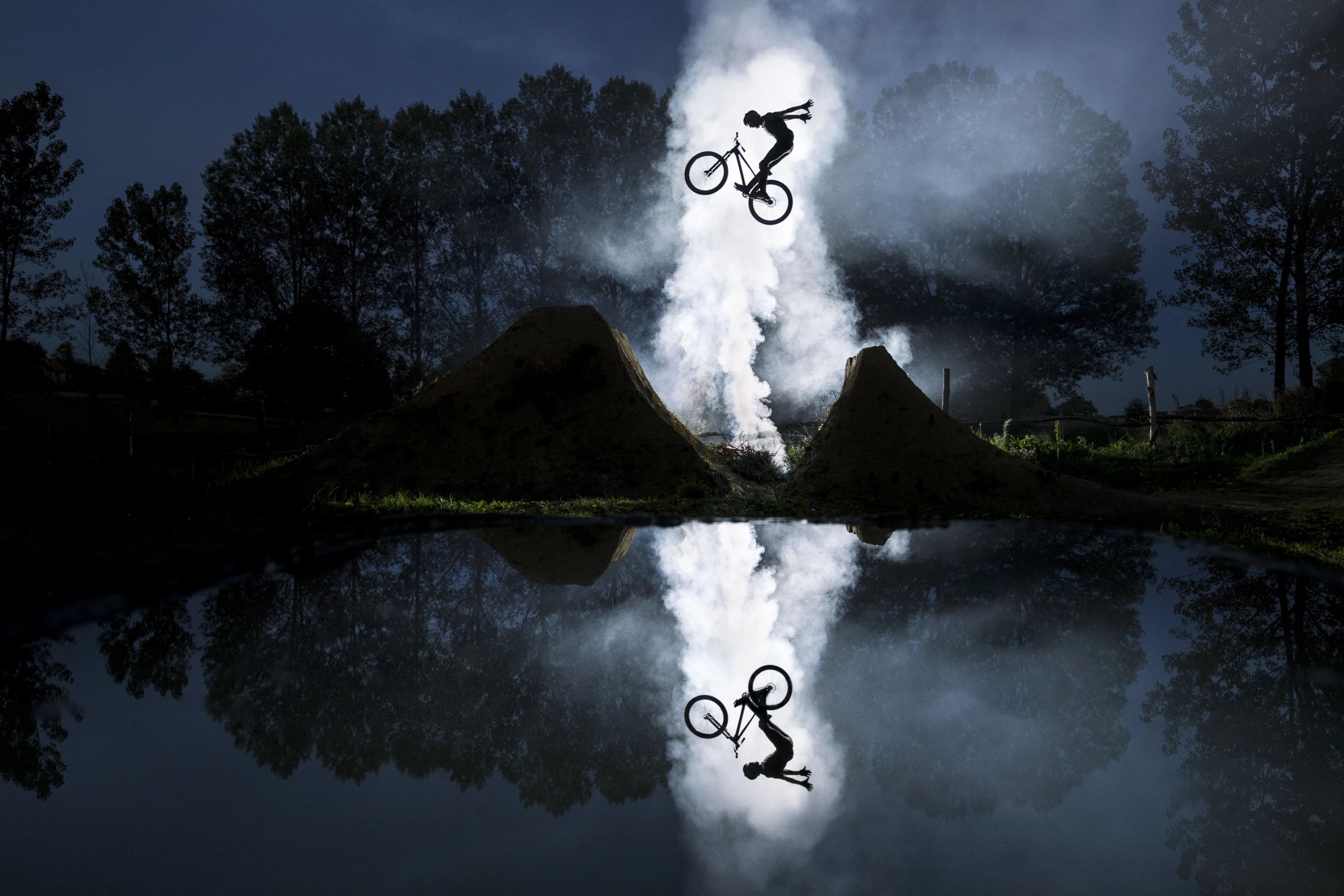 The winner of the Emerging (by Red Bull Photography) category was Jean-Baptiste Liautard of France, with a doubly-inspiring reflection shot of mountain biker Jeremy Berthier, mid-jump by moonlight