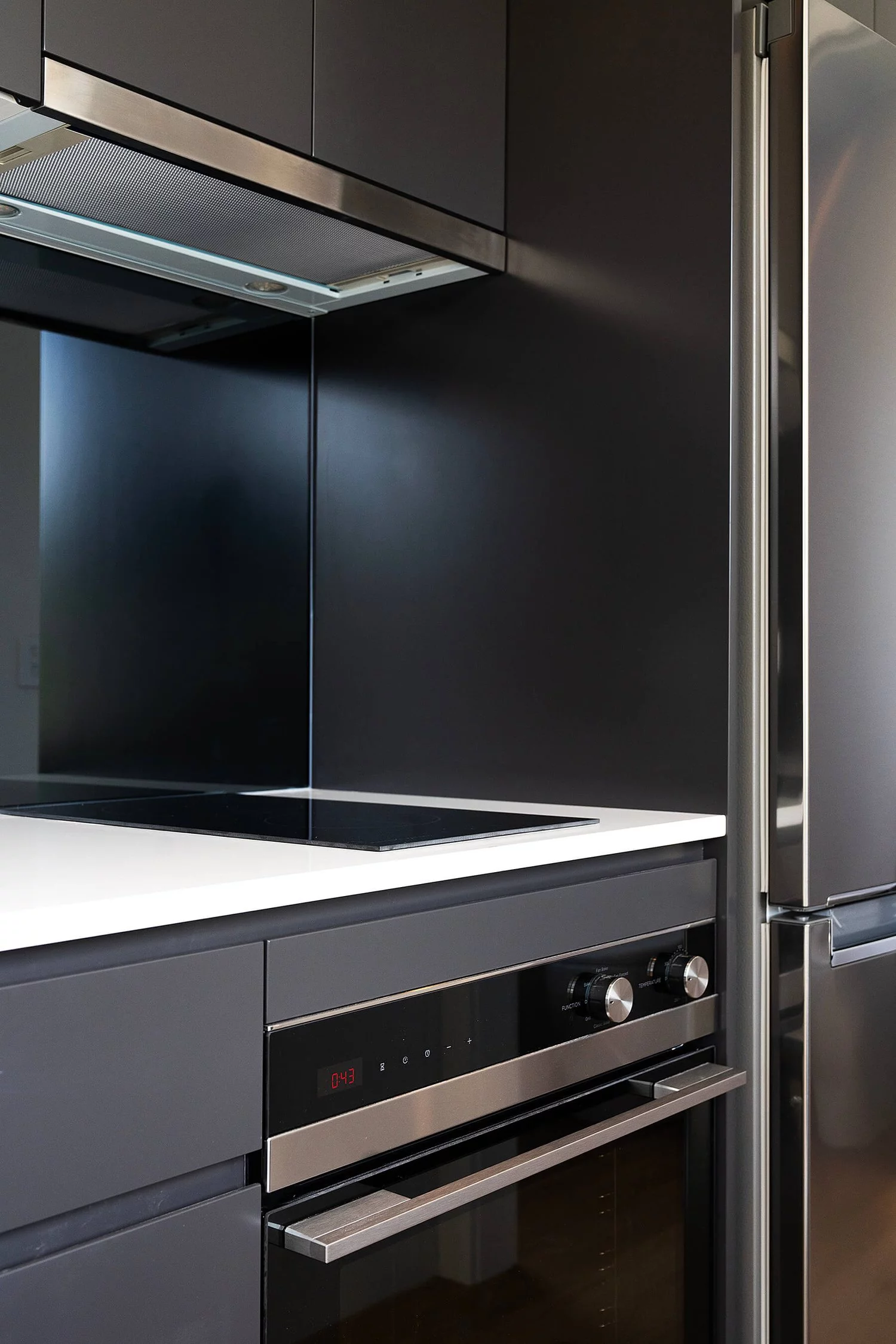 The Wanda's kitchen includes an oven and an induction cooktop