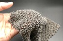 The 3D-printed chain-mail-like fabric in aluminum