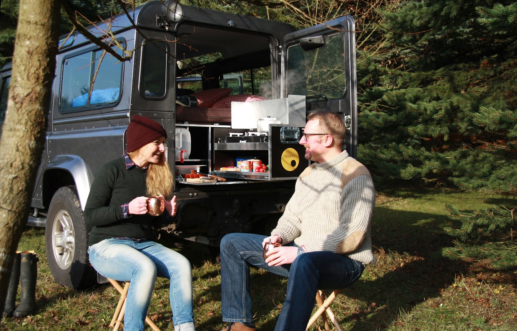 The middle cubby fits two folding camp stools