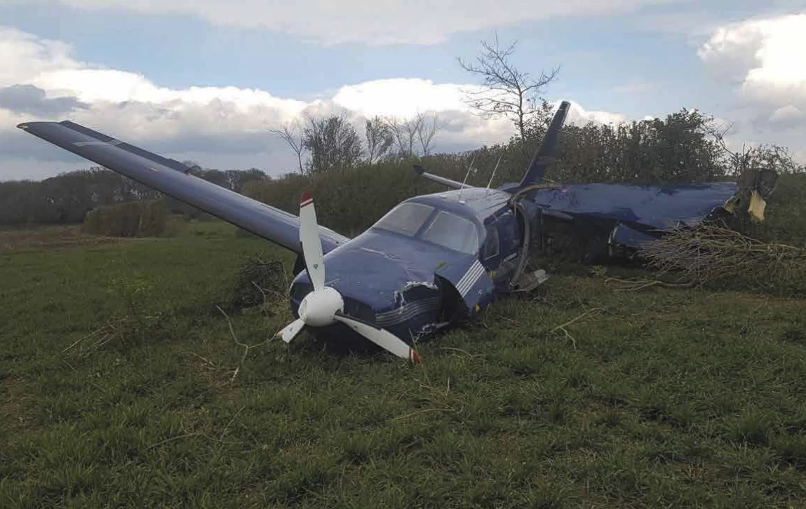 The test plane made a forced landing in a field, losing a wing to a hedge before hitting a ditch and coming to an abrupt halt – nobody was injured