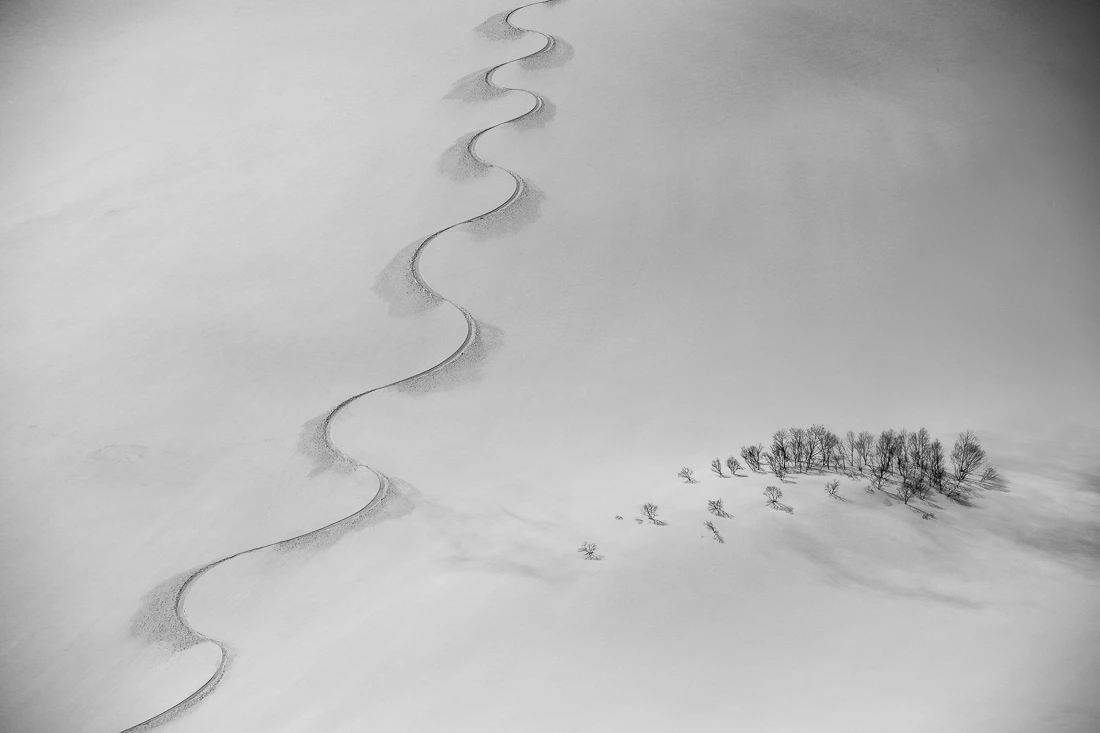 Black and White Minimalist Photography Awards. Top 50. 'Snowboard Track on Norikura'. Hakuba, Japan.