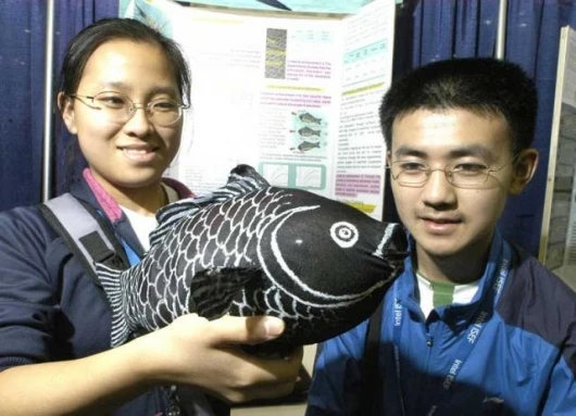 Xing Lu and Chang Liu, both 18, from Wuhan, China, with their project, a Bionic Robofish - a robot that is helping explore new underwater navigation techniques