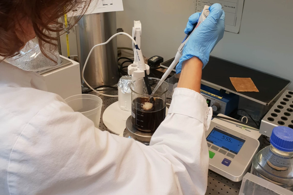 A lab researcher works with the superabsorbent material made from wheat gluten