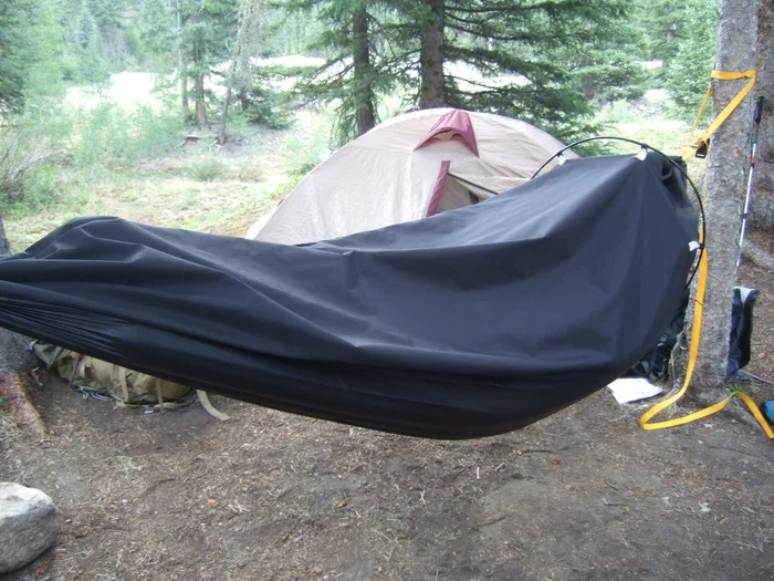 The Alpine Hammock is a lightweight, two-in-one shelter for backpacking and mountaineering