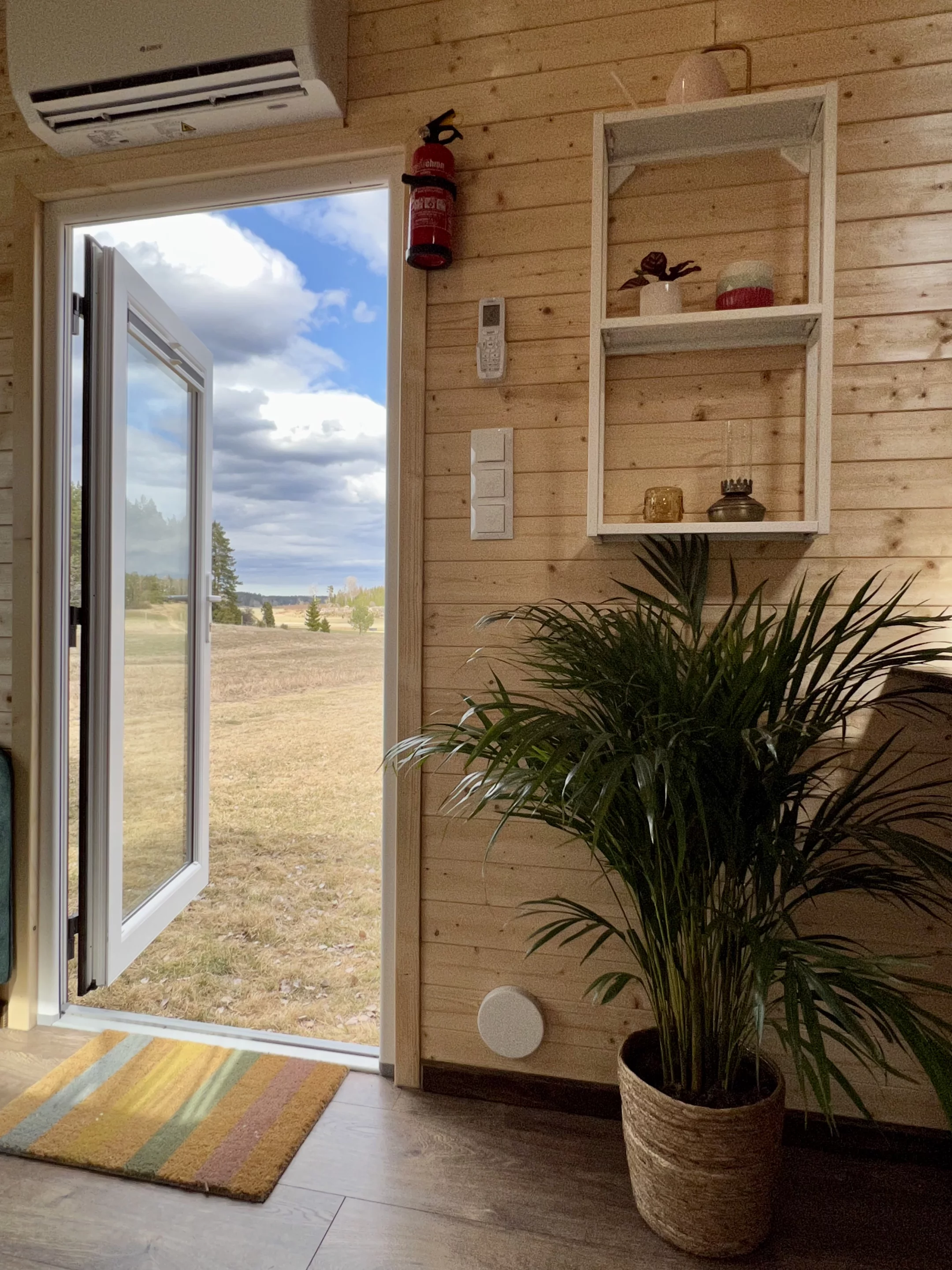 The Sunshine tiny house's interior is finished in spruce