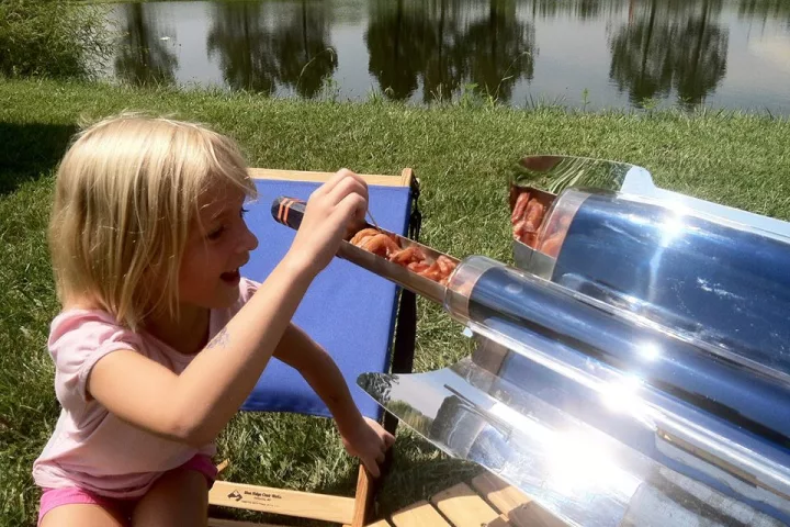 The GoSun Stove uses parabolic mirrors to concentrate sunlight onto a glass tube and cook the contents inside, allowing it to act as a portable convection oven