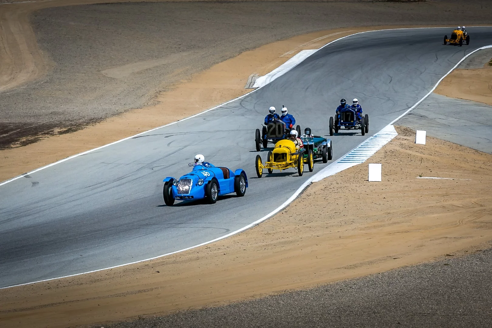1946 Delage D6 leads the way after surviving Laguna Seca's notorious Corkscrew