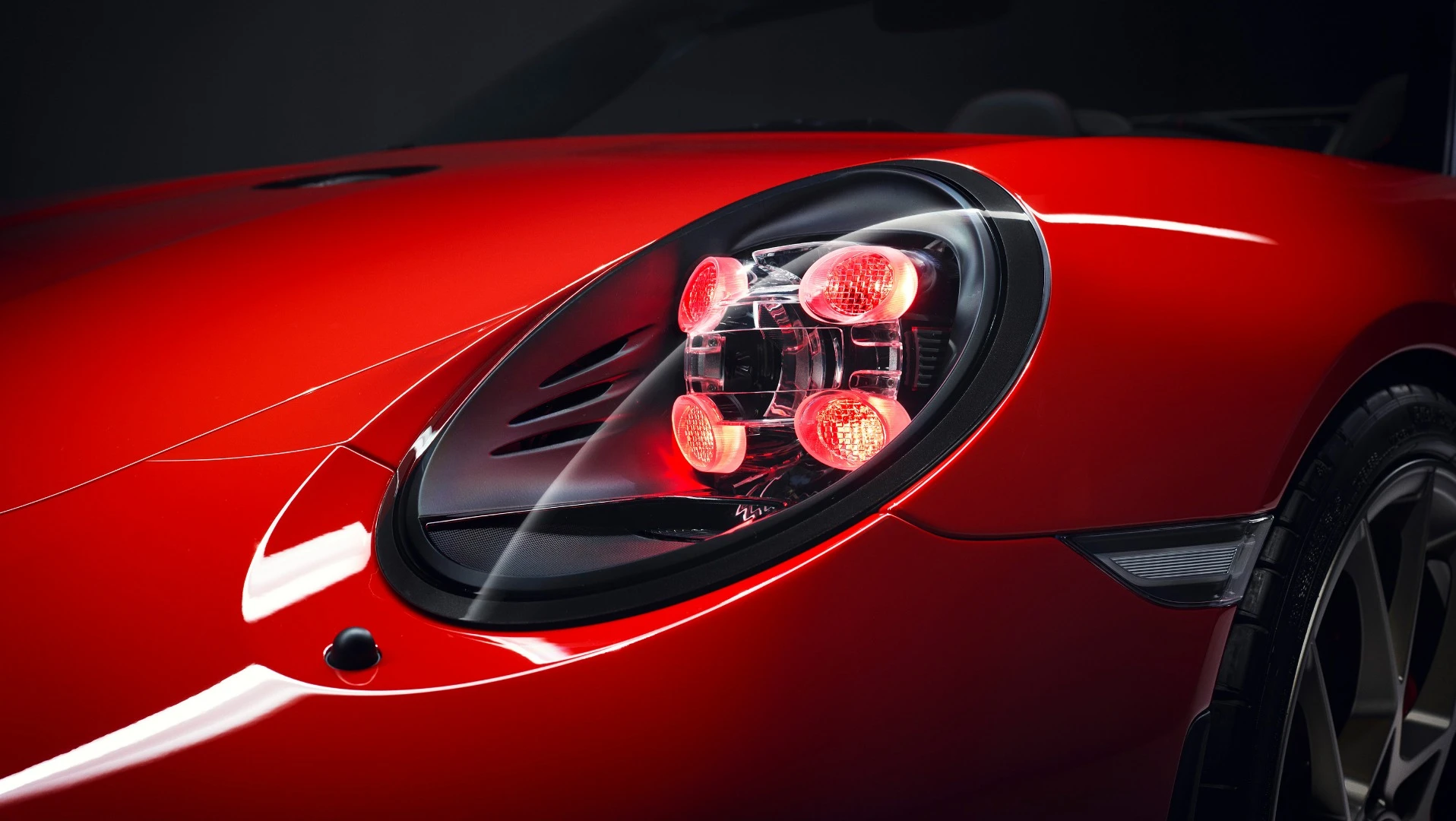 The tint on the daytime running lights of the Porsche 911 Speedster shown in Paris matches its paintwork