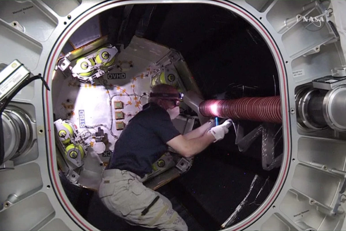 Astronaut Jeff Williams works inside the Bigelow Expandable Activity Module
