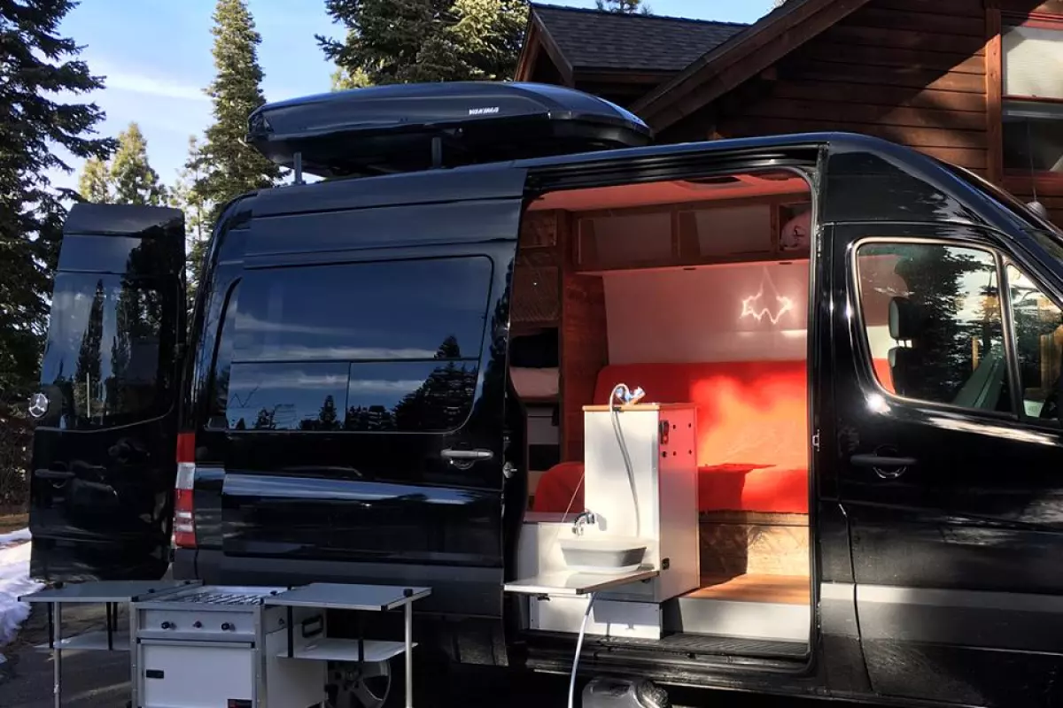 With its removable stove module and 6-foot faucet, the TK Van kitchen works seamlessly inside or out