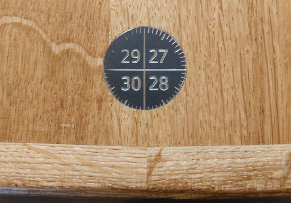 The tables have numbered plaques to help in serving