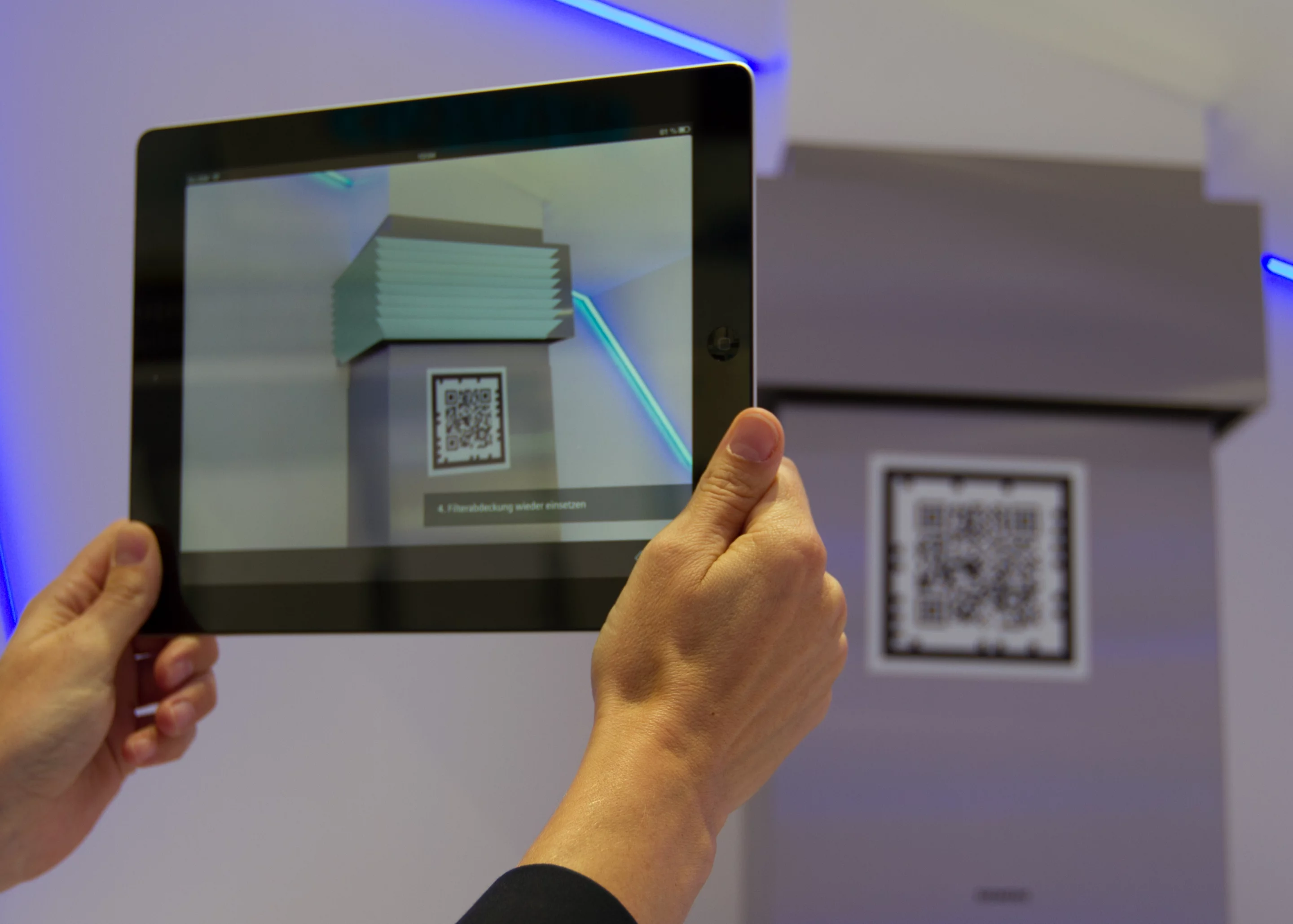 Siemen's app gives AR instructions on how to replace the range hood's filter