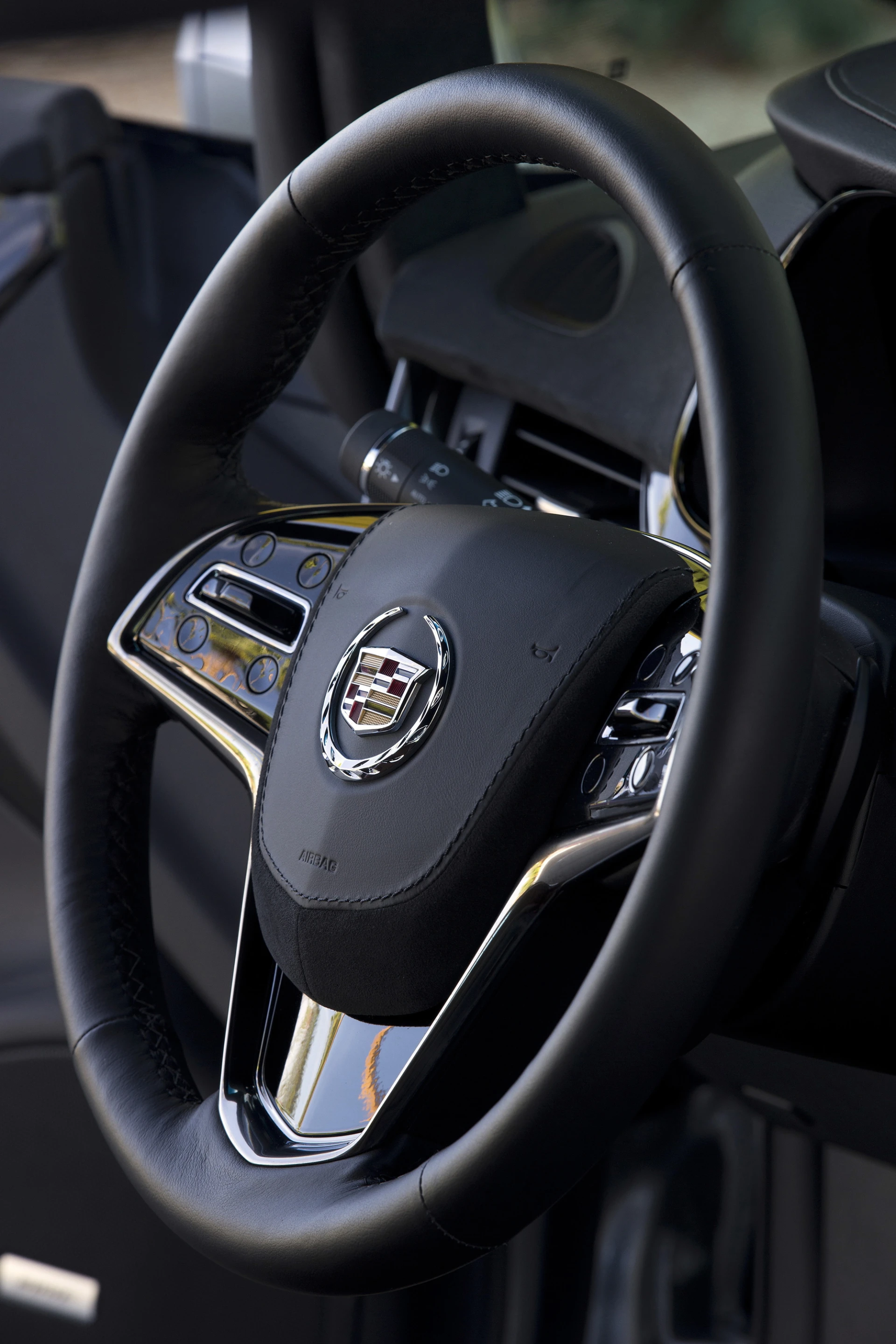 Novel slowing paddles on the steering column help charge the battery