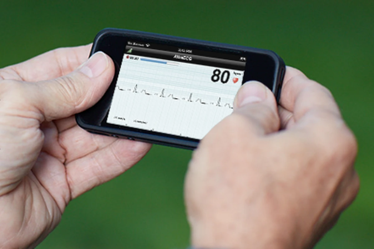 The AliveCor Heart Monitor attaches to the back of an iPhone 4 or 4S