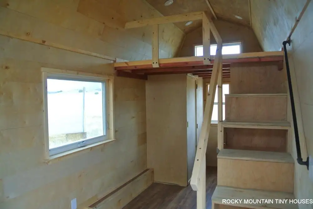 Storage-integrated stairs lead to the Bitterroot Valley's loft bedroom