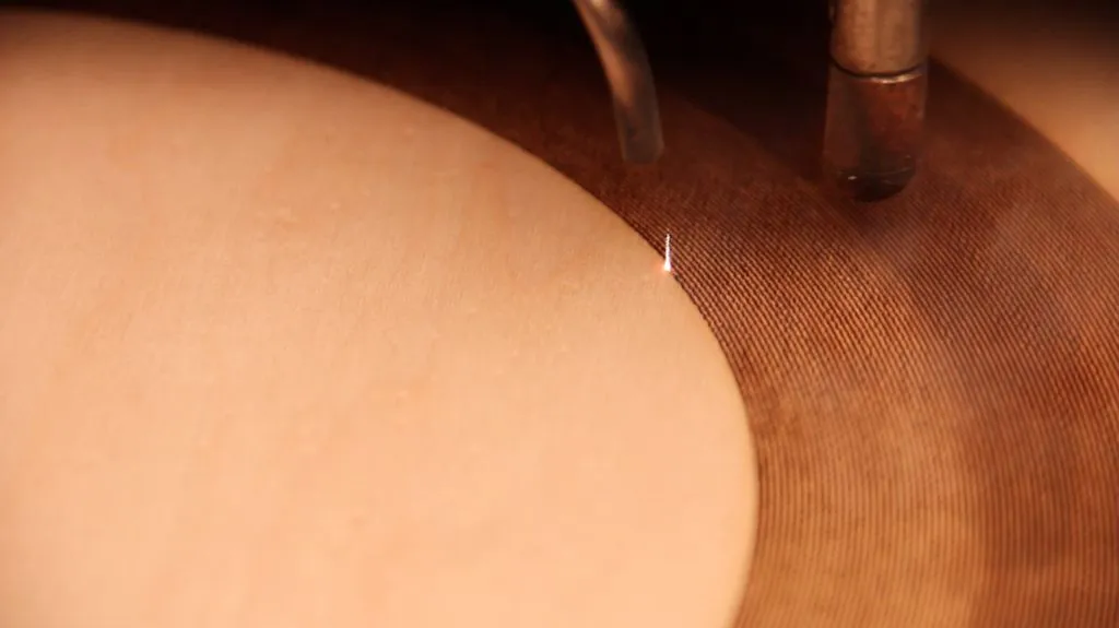 After obtaining a round piece of wood, a laser cutter sliced the tiny bumps and grooves of the record using the vector file as a guide