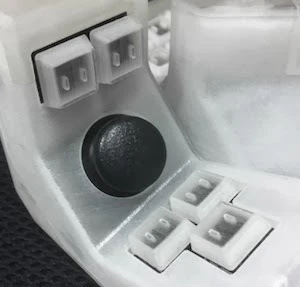 The thumb joysticks can act as both a standard analog joystick or as a vertical or horizontal mouse scroll wheel