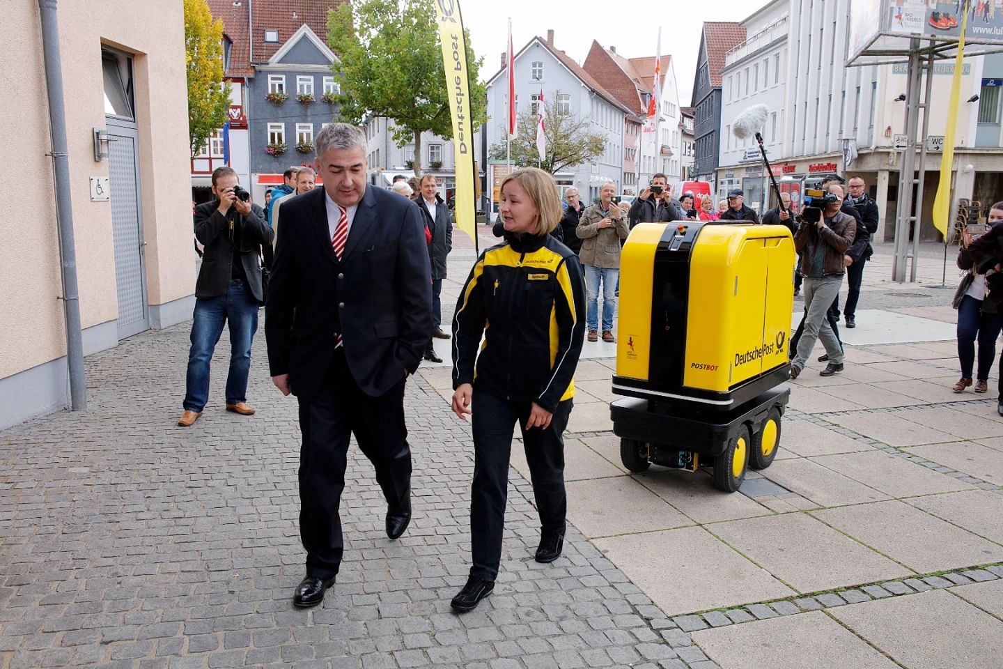 Standing 150 cm tall (just under 5 ft), the PostBOT scurries along at up to 6 km/h (3.7 mph)