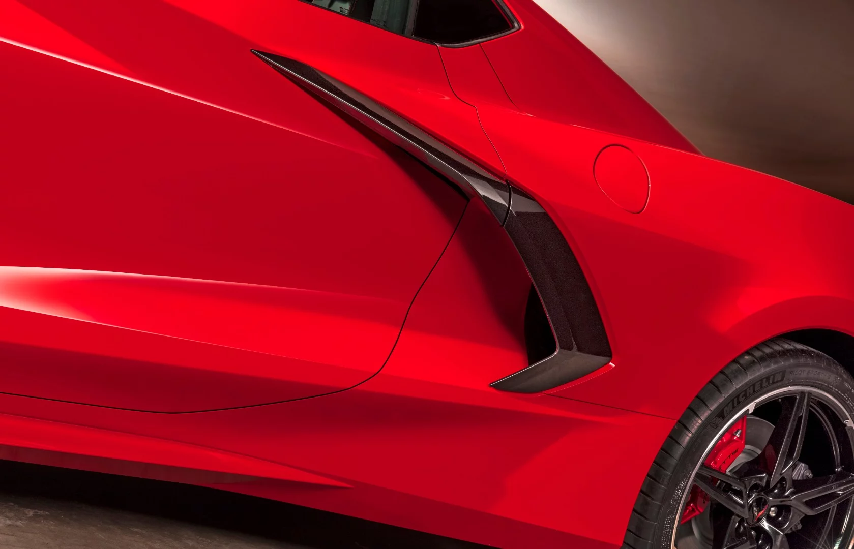 Not unlike many Italian supercars, the Corvette features strong side intakes to bring air to the huge V8