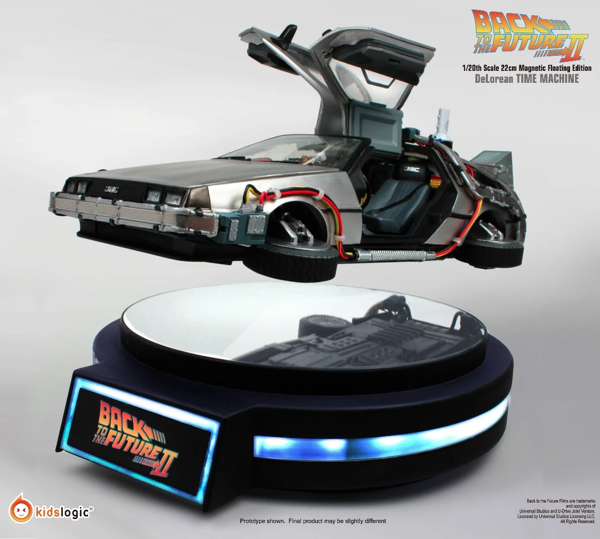 Scale model replica of the Back the the Future II DeLorean hovering over its magnetic base