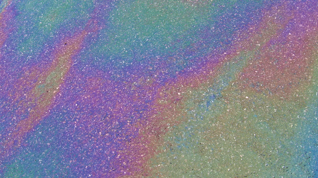 An all too common sight - the car park oil sheen rainbow (Photo: crabchick via flickr)