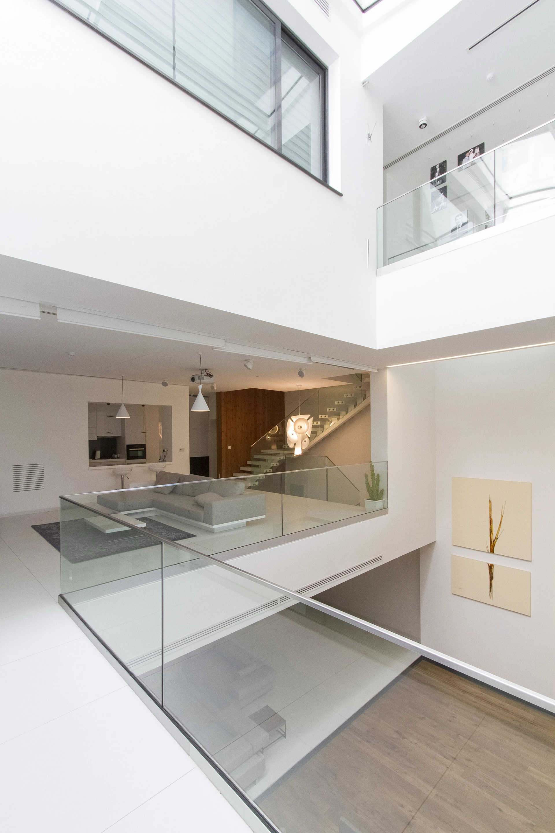 The first and second floors feature communal family spaces including the kitchen, lounge, and television room (Photo: Nextoffice)