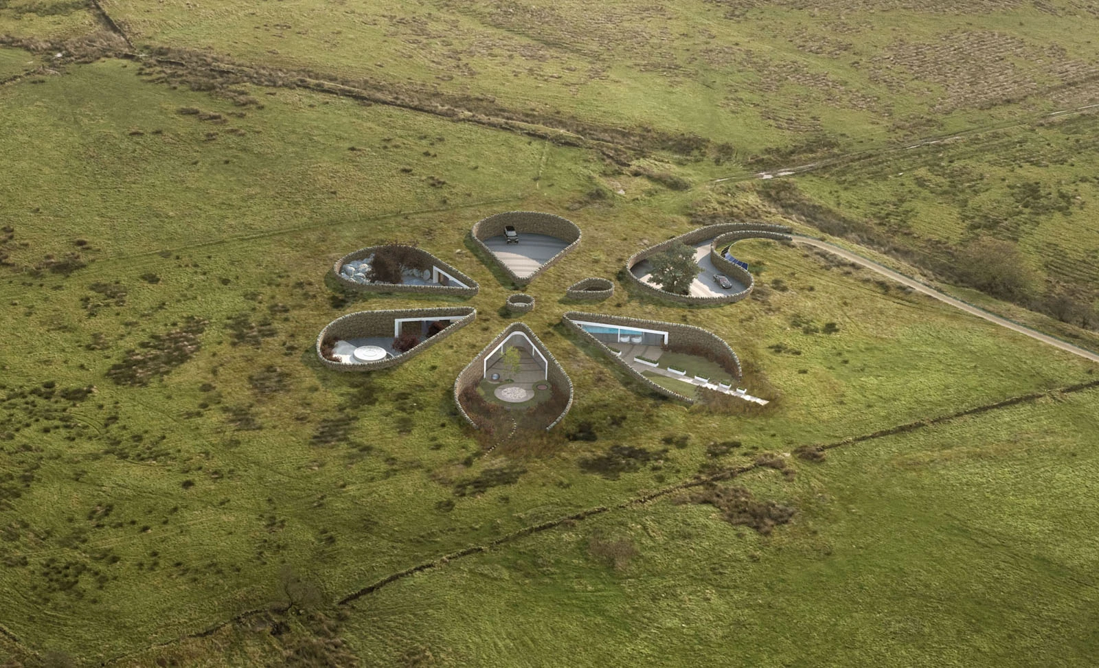The Bolton Eco house is buried into the landscape and has six exposed nodes all pointing towards the underground centre of the home