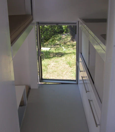 The guest home features an adjustable double bed and living/dining space that can accommodate up to eight guests