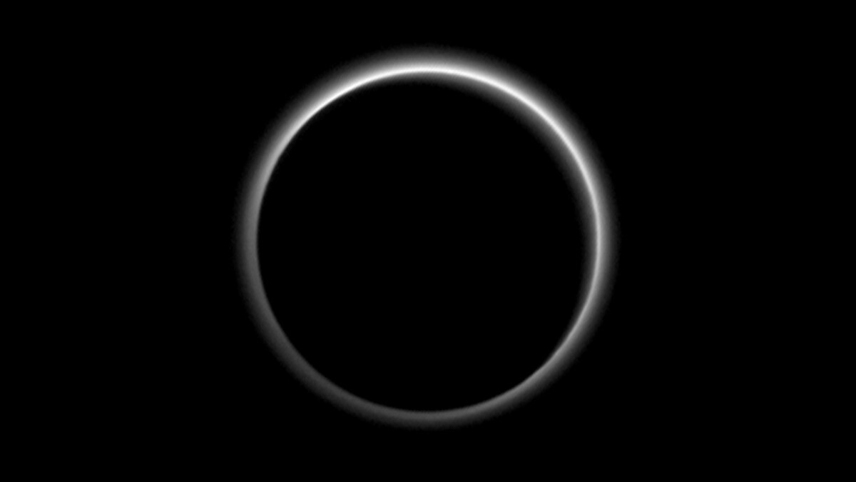 Backlit image of Pluto showing atmospheric haze