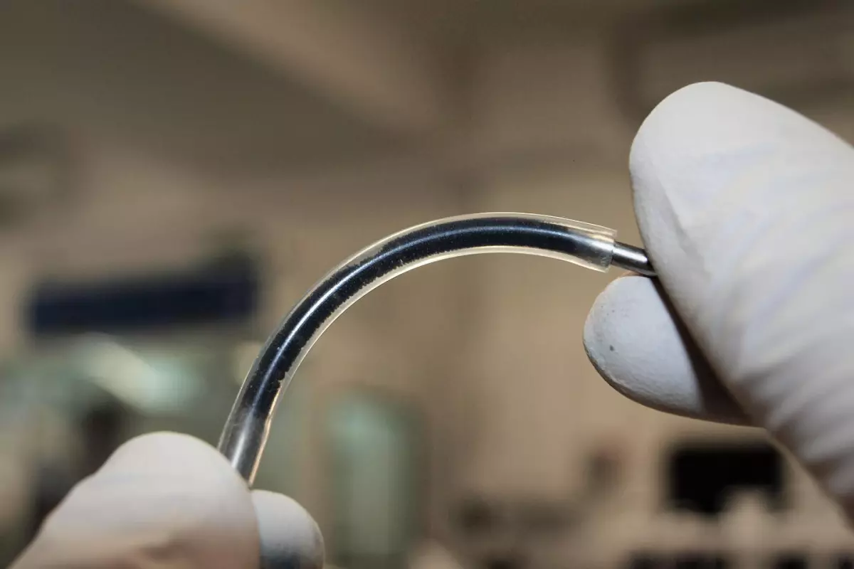 A flexible tube, filled with an emulsion of water, oil and graphene