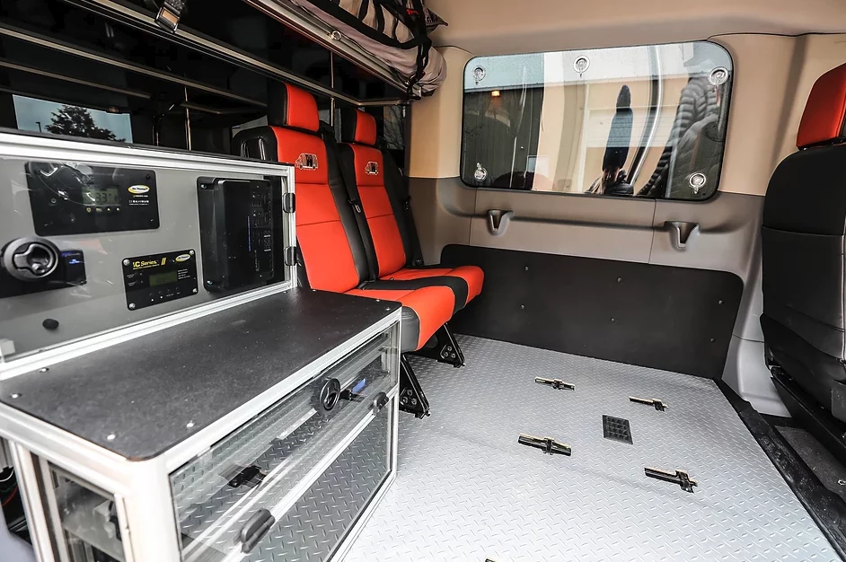 Take the middle row of seats out and you have a place to mount the kitchen block