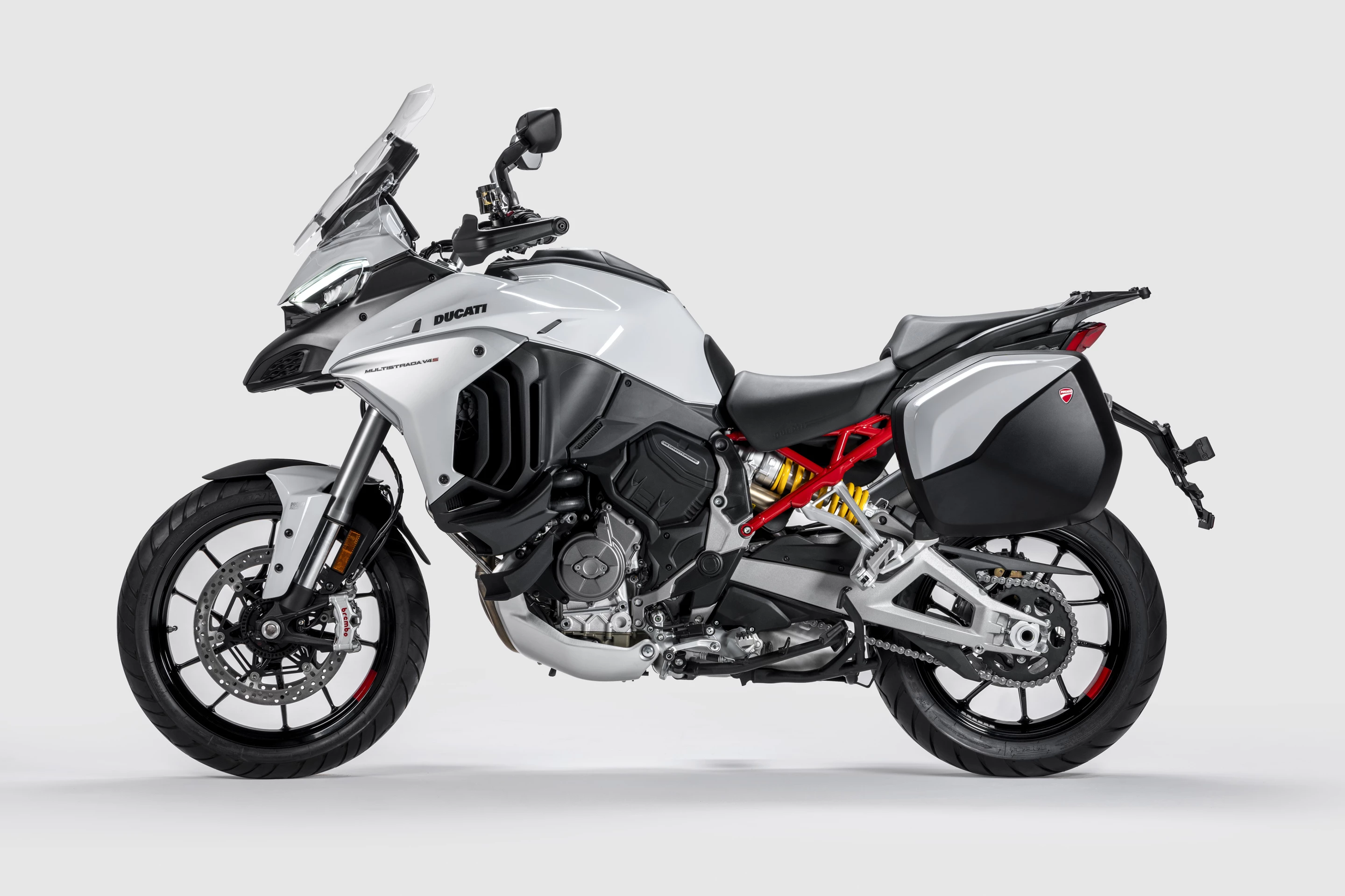 Adaptive suspension will lower itself down to minimum spring preload when it's time to put a foot down. What a lovely touch