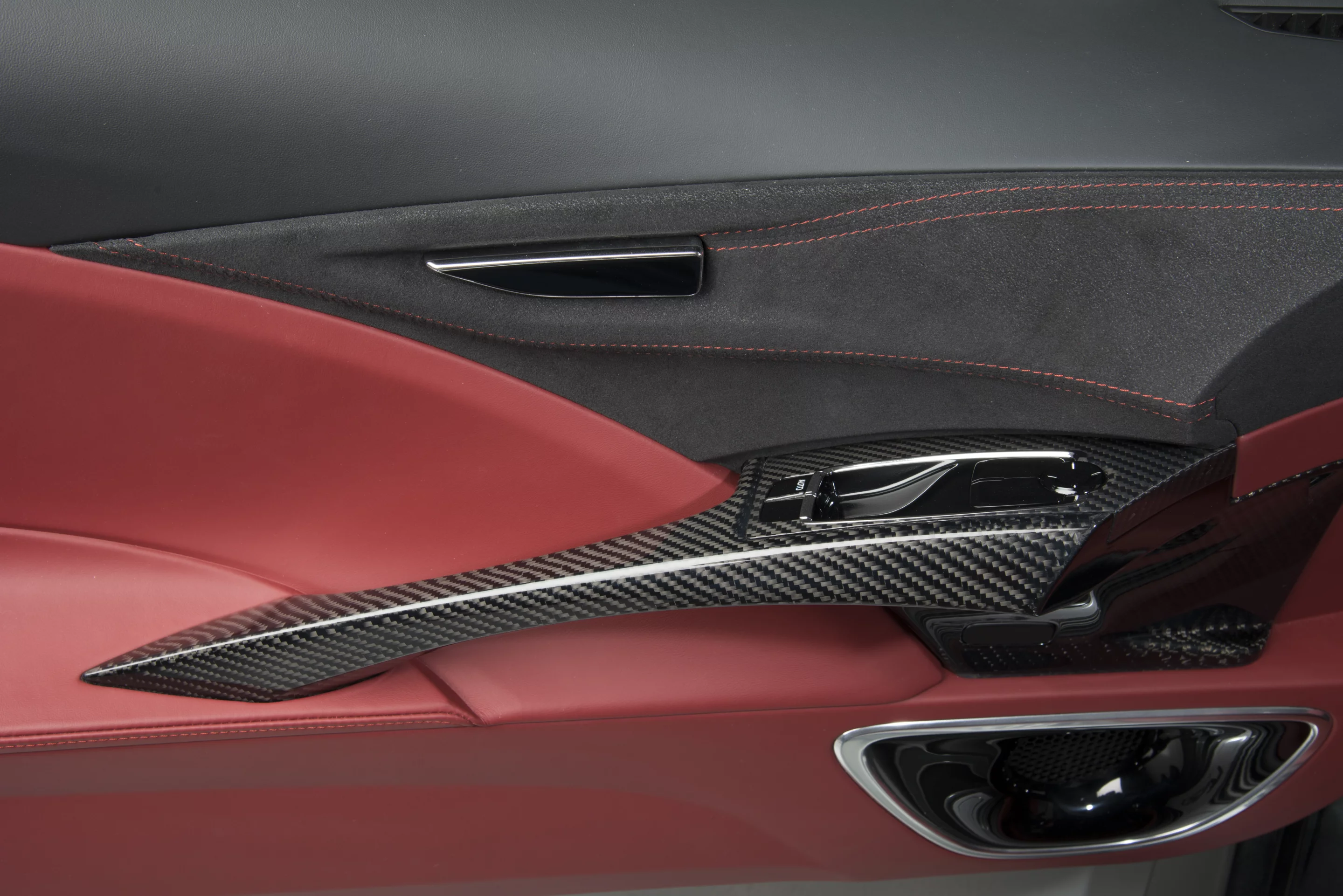 The 2013 NSX Concept interior features red leather and carbon fiber