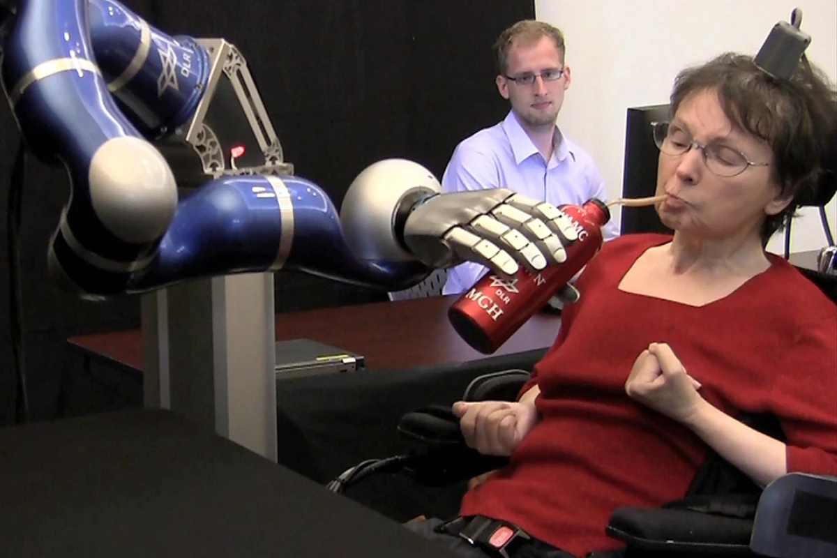 A paralyzed woman has used the experimental BrainGate neural interface system to get herself a drink of coffee, via a thought-controlled robotic arm