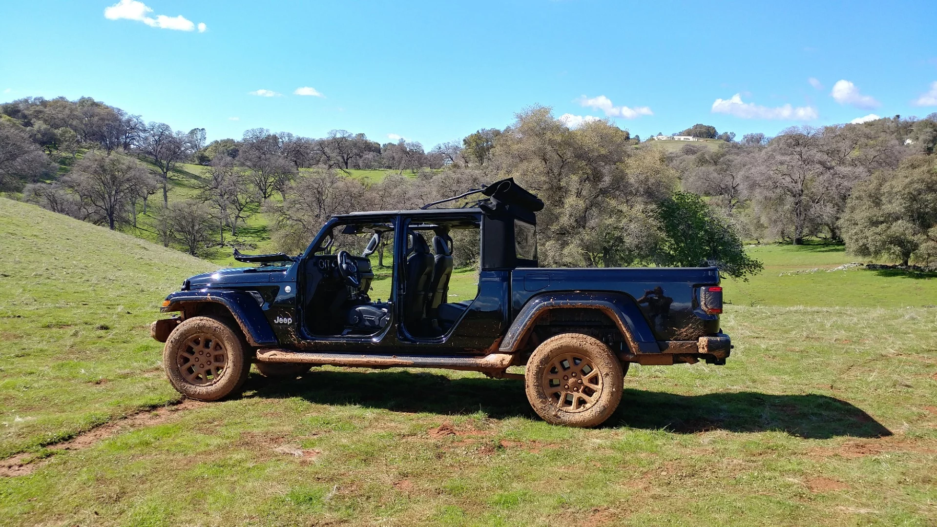 Skid plates and front and rear tow hooks are standard on all models of the Gladiator